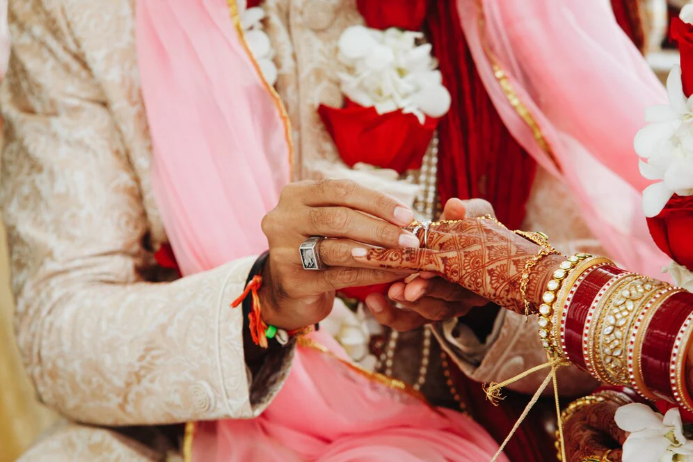 wedding-ritual-putting-ring-finger-india_8353-10048_8c3ba2c6-a770-442e-8c63-93b4cefd122c.jpg.webp